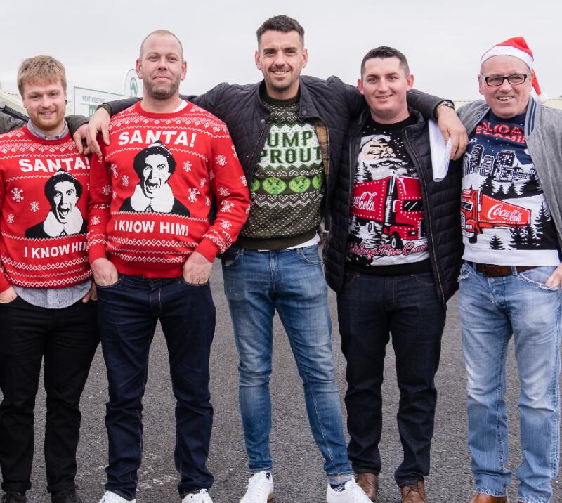 A group of race goers in their Christmas jumpers.