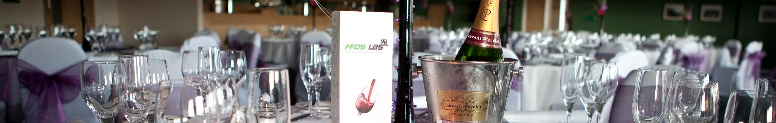 Champagne sand glasses on a table