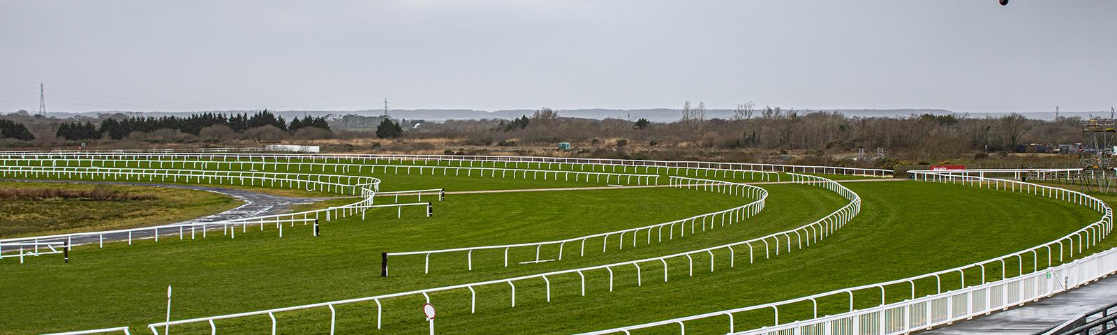 View from the grandstand towards the track at Ffos Las Racecourse.