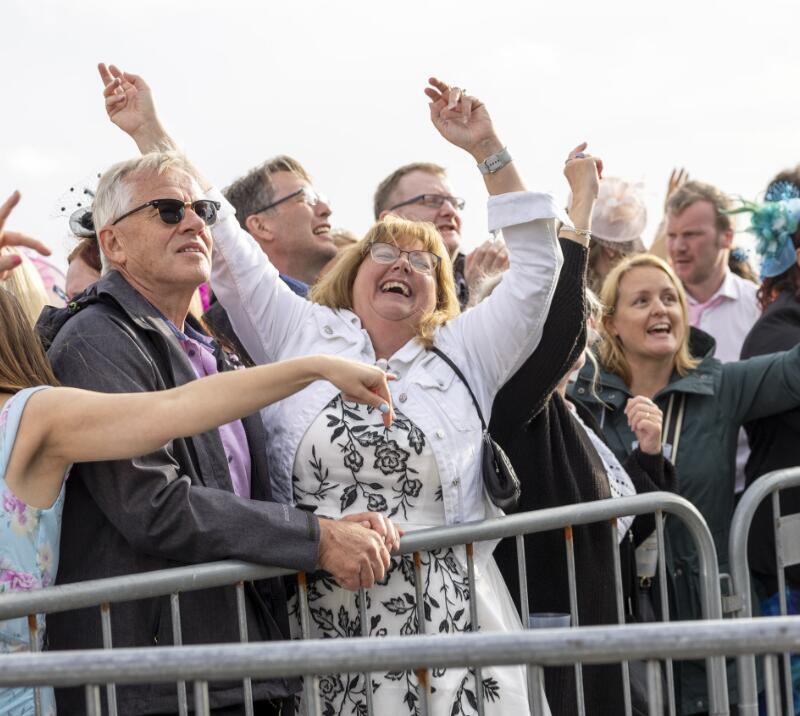 A race goer pulls some brilliant dance moves at Ffos Las Racecourse