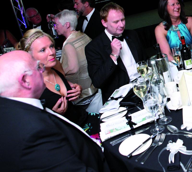 A group of people enjoying a party evening at Ffos Las